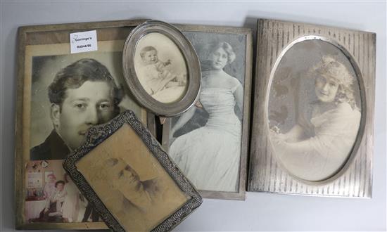 Five assorted silver mounted photograph frames.